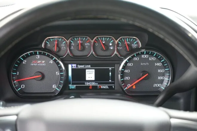 Canadian-spec GM instrument cluster displaying km/h and Celsius.
